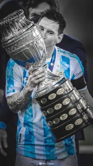 Messi Lifting World Cup Wallpaper
